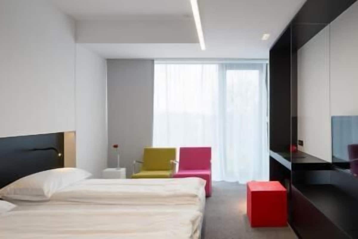 Premium bedding, memory foam beds, minibar, in-room safe