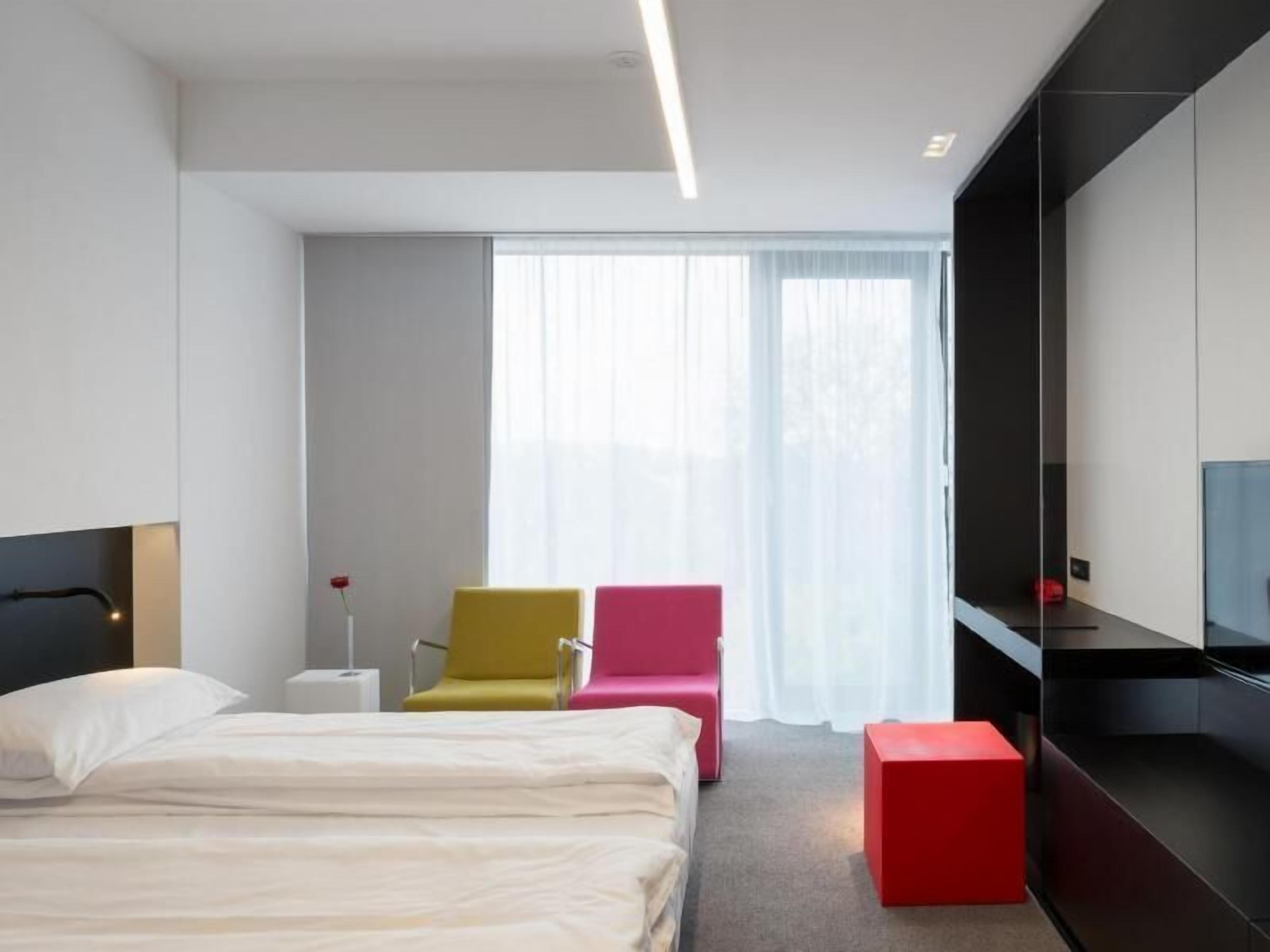 Premium bedding, memory-foam beds, minibar, in-room safe