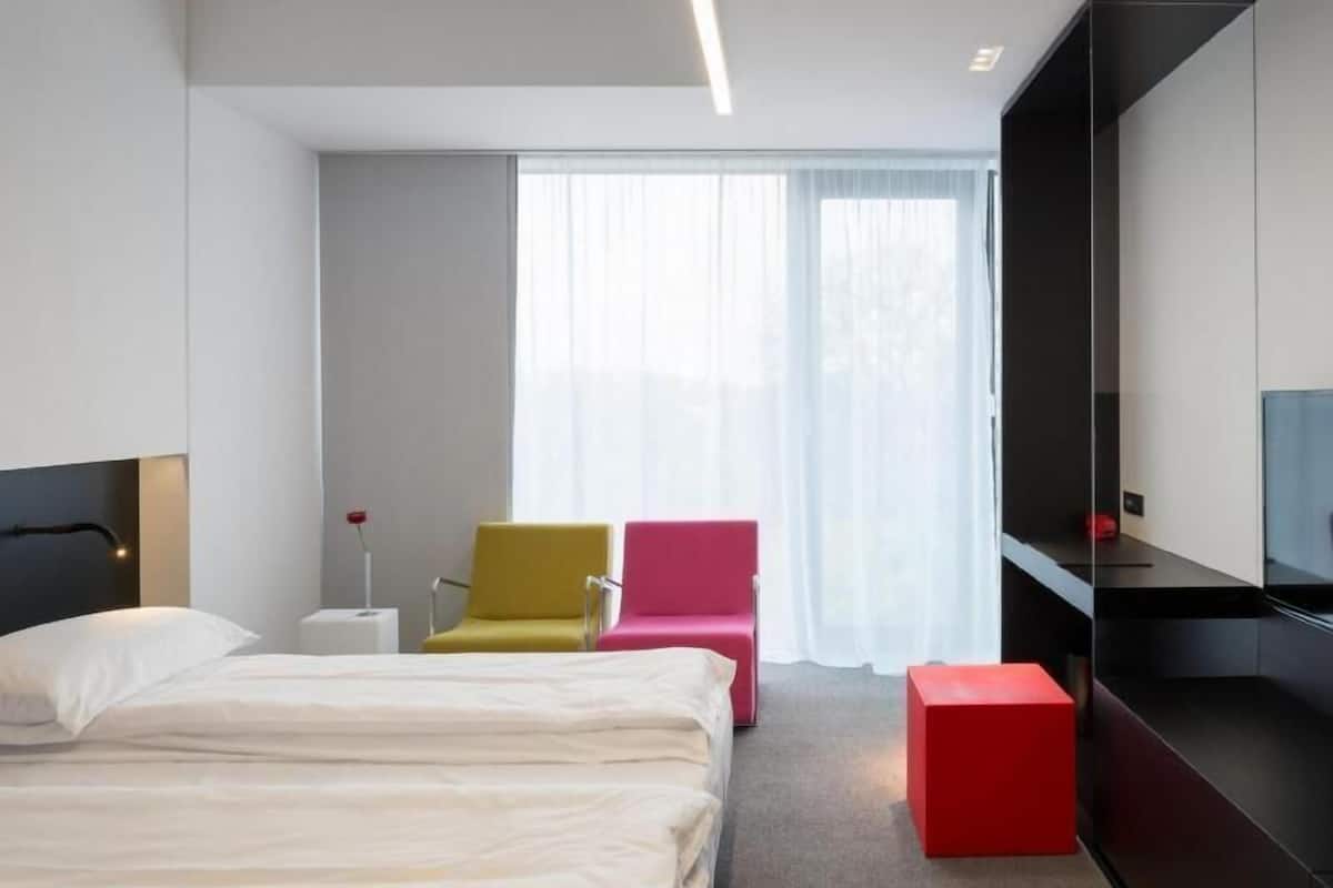 Premium bedding, memory foam beds, minibar, in-room safe