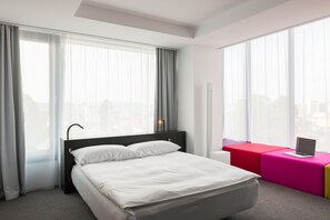 Premium bedding, memory-foam beds, minibar, in-room safe