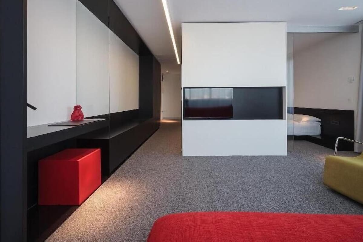 Premium bedding, memory foam beds, minibar, in-room safe