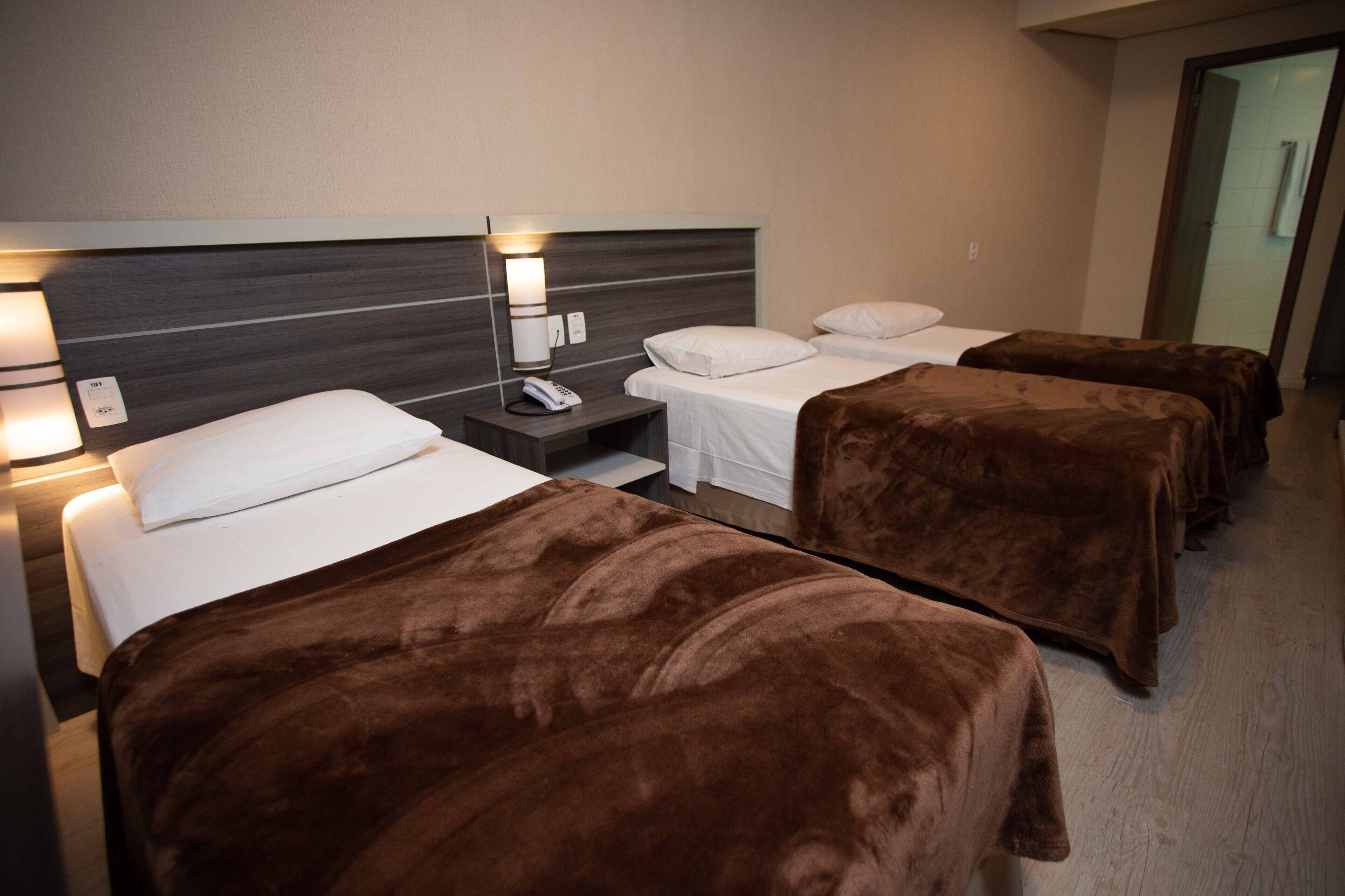 classic triple room, 3 single beds | minibar, in-room safe, desk, free wifi