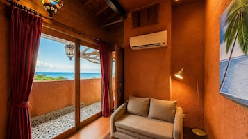 Familienzimmer, Meerblick | Wohnbereich | Fernseher