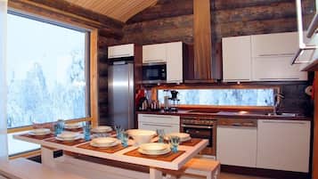 Chalet, 4 Bedrooms, Sauna | Private kitchen | Fridge, microwave, stovetop, dishwasher