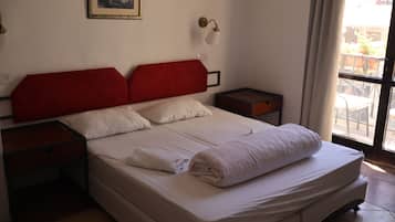 Comfort Quadruple Room | In-room safe, free WiFi, bed sheets