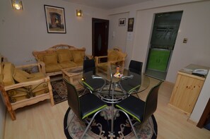 Apartment | Living room | Flat-screen TV - Almudena Apart Hotel (La Paz)