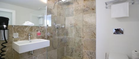 Shower, hair dryer, towels