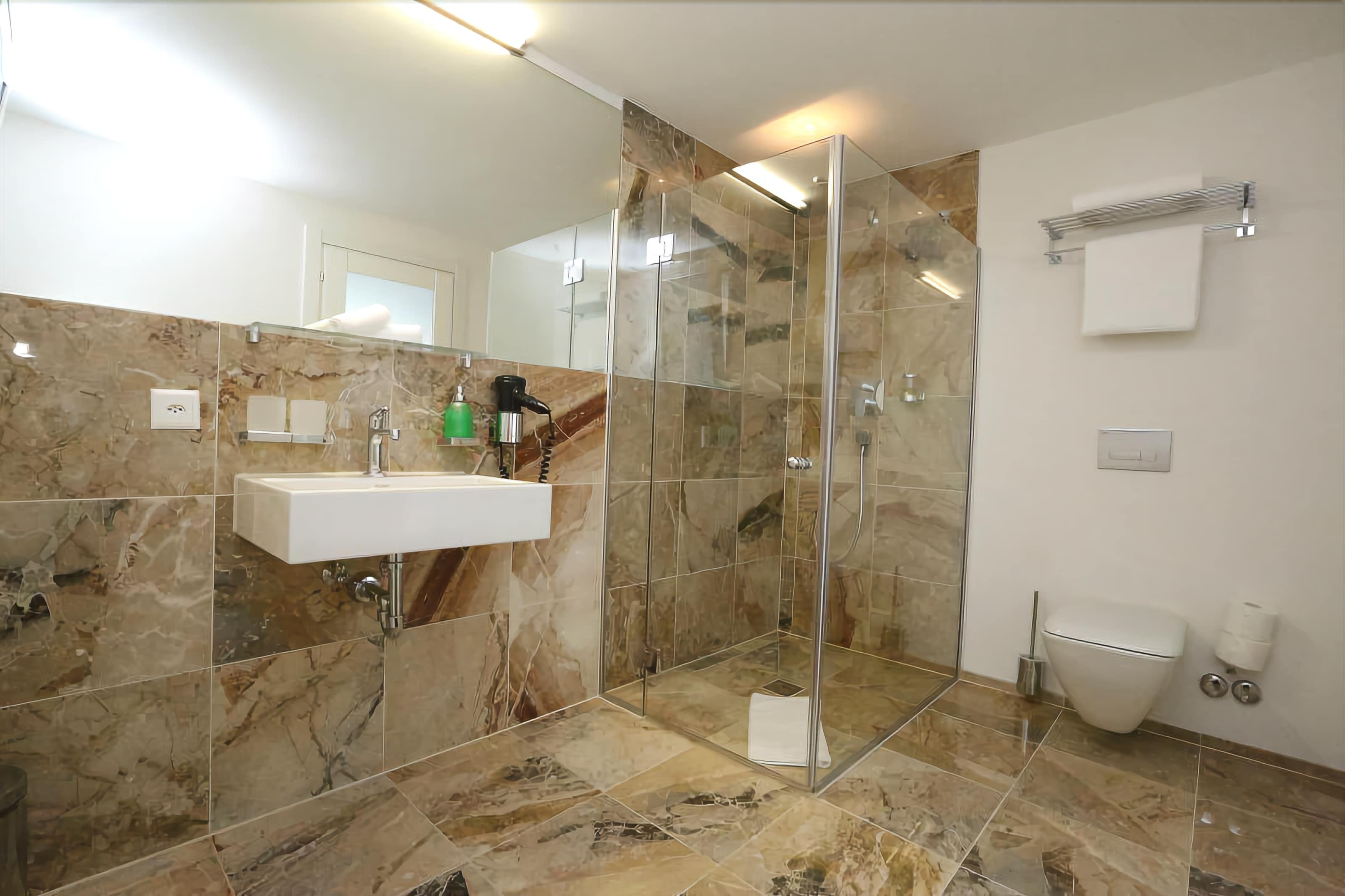 family room | bathroom | shower, hair dryer, towels