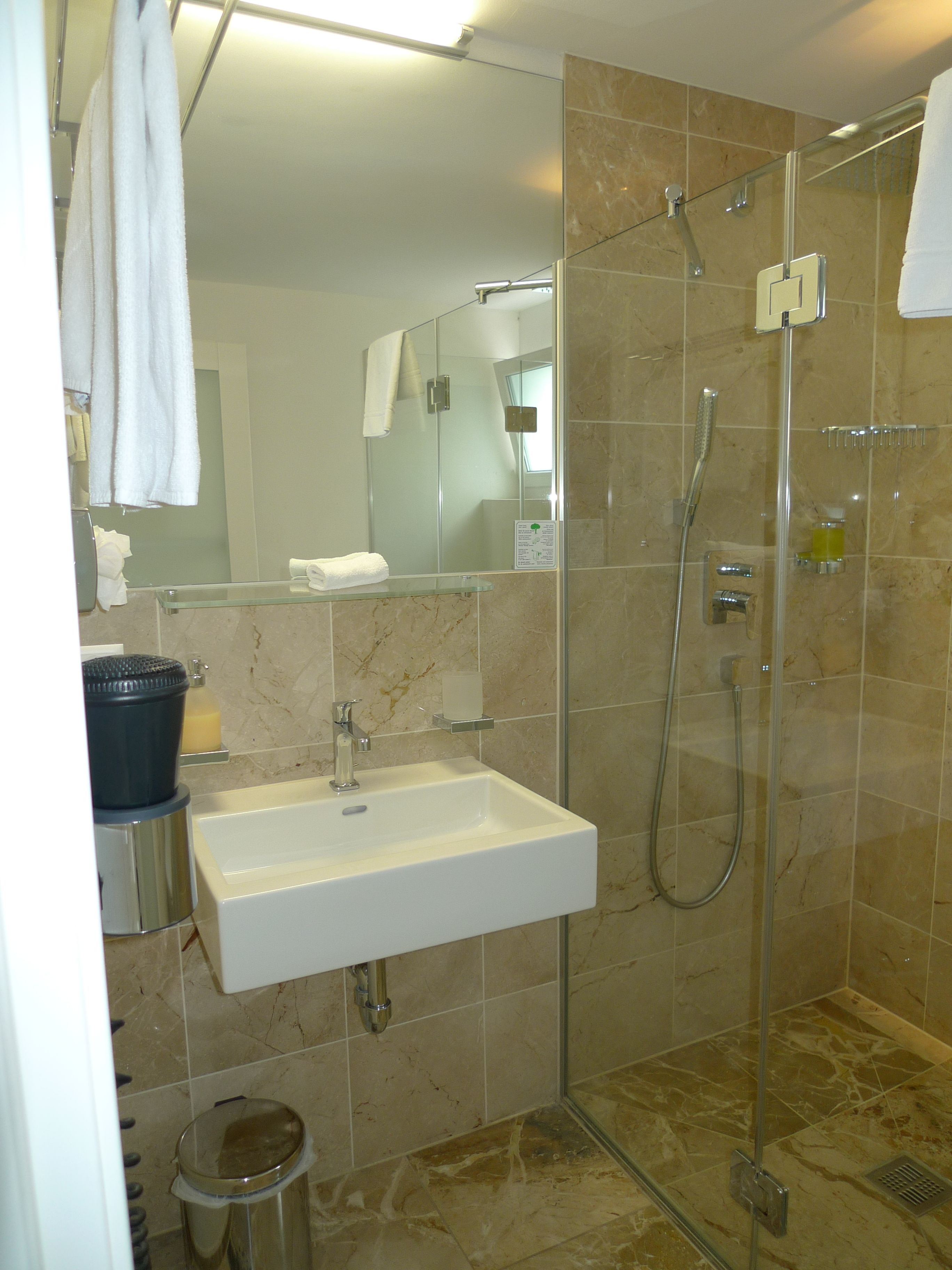 economy double room, 1 king bed | bathroom | shower, hair dryer, towels