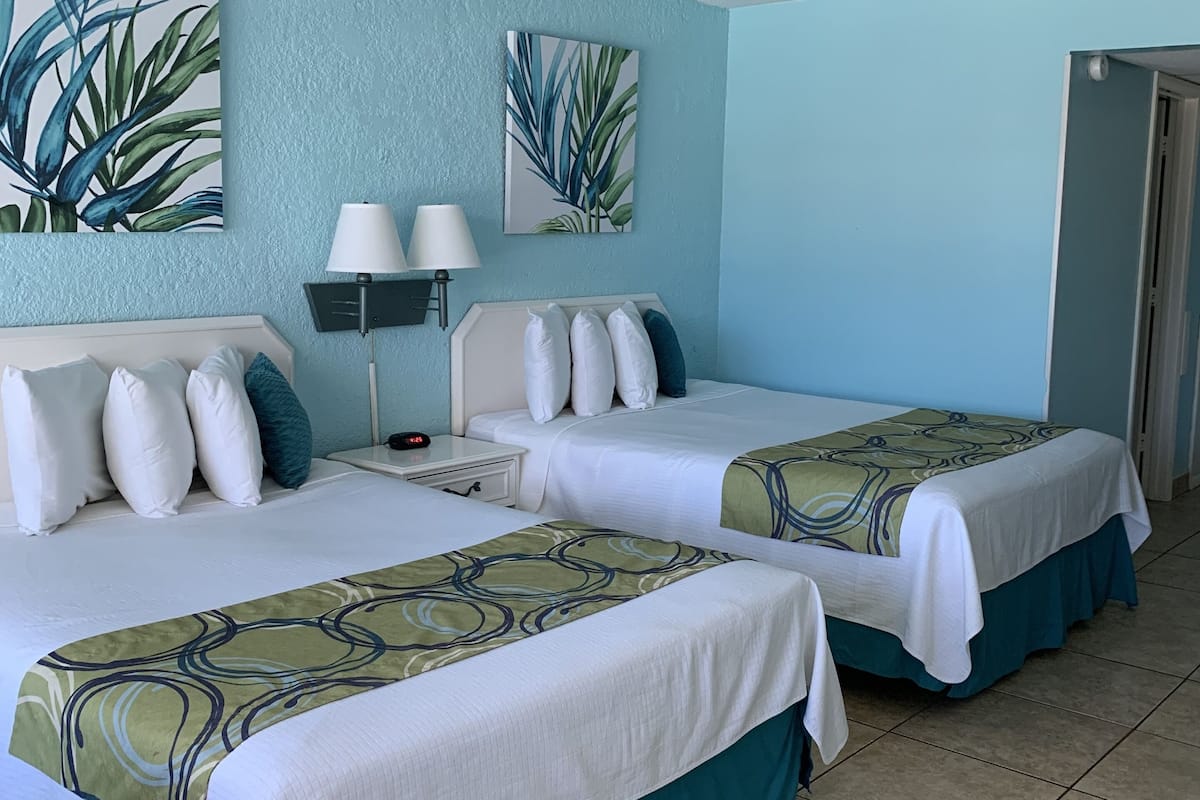 room, 2 queen beds, balcony, ocean view | 1 bedroom, individually decorated, individually furnished