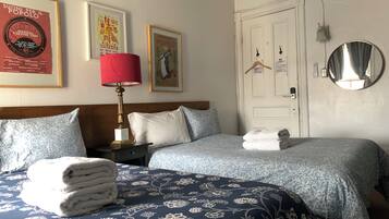 Economy Double or Twin Room, 2 Queen Beds, Non Smoking, Shared Bathroom | Individually decorated, individually furnished, blackout curtains