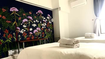 Economy Double or Twin Room, 2 Queen Beds, Non Smoking, Shared Bathroom | 1 bedroom, individually decorated, individually furnished