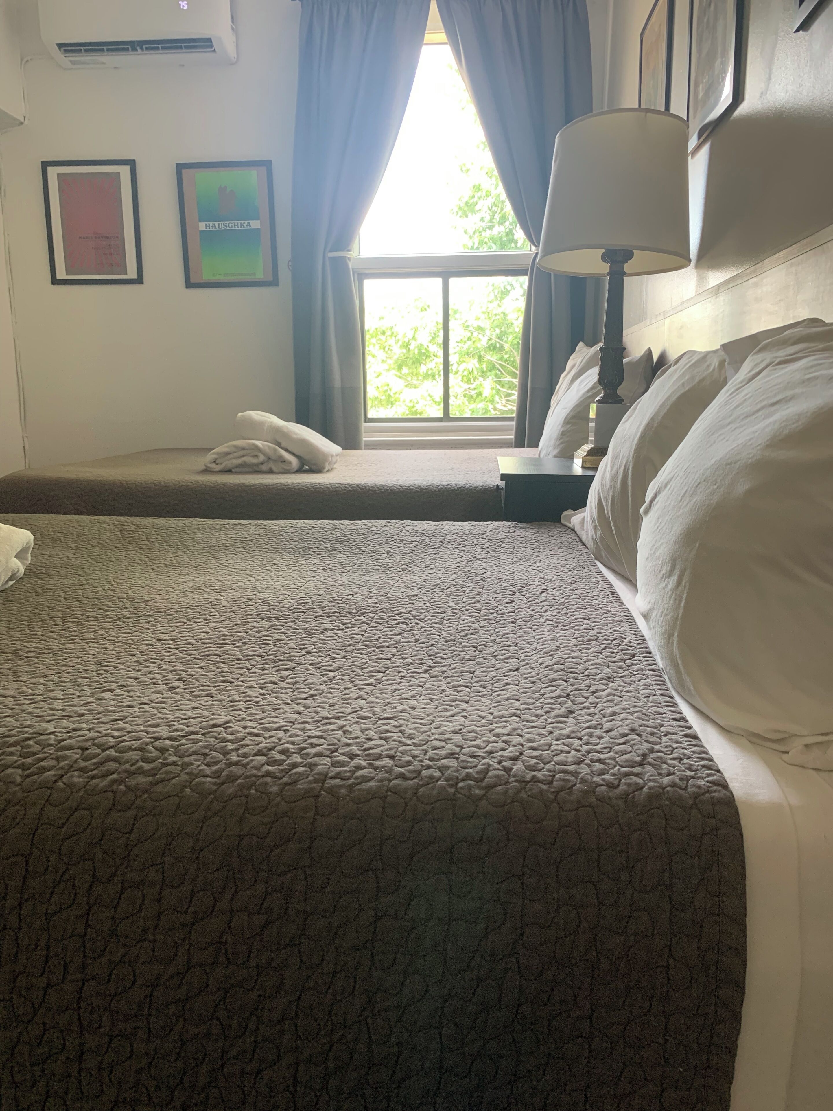 Economy Double or Twin Room, 2 Queen Beds, Non Smoking, Shared Bathroom | Individually decorated, individually furnished, blackout drapes