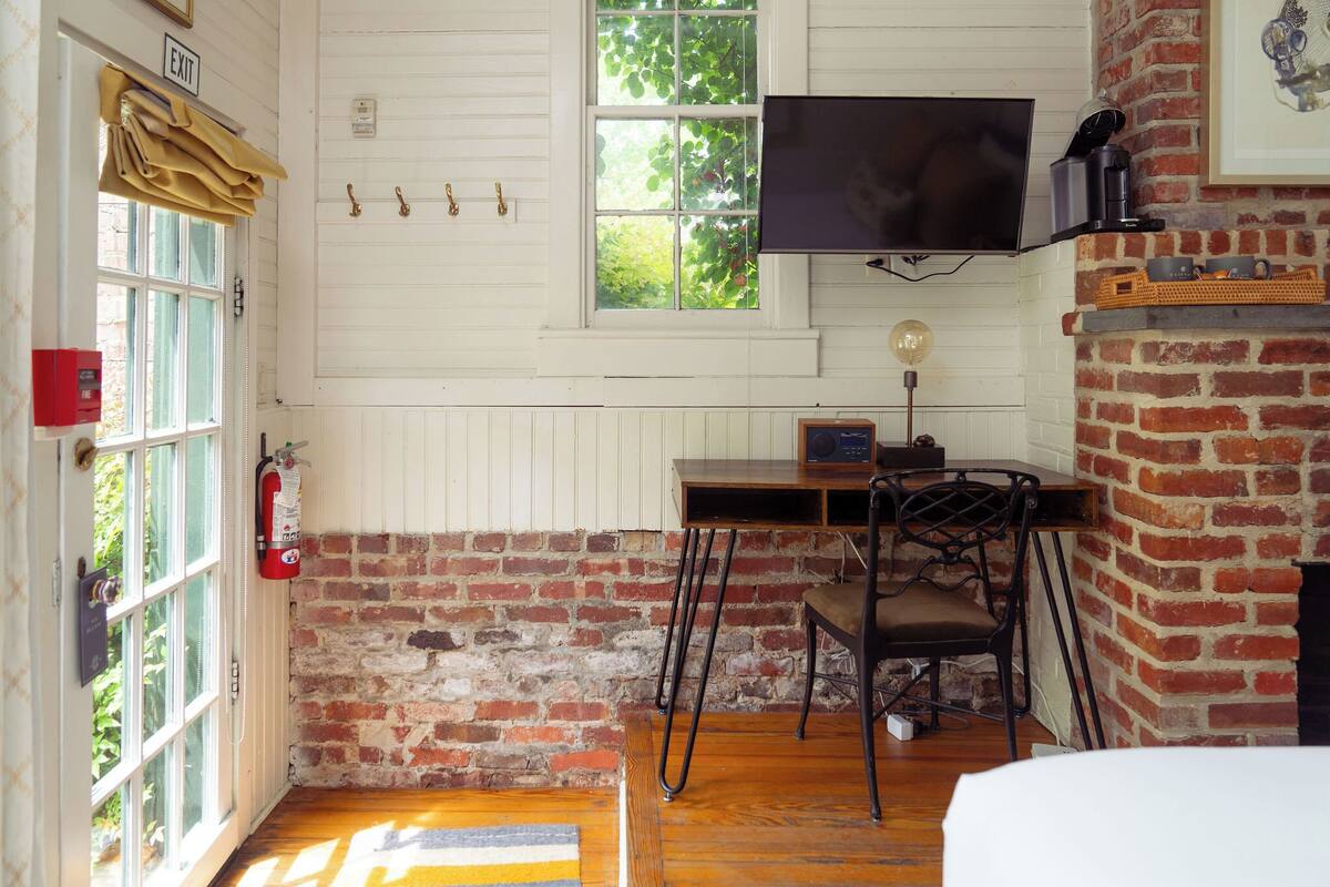 garden room | premium bedding, pillow-top beds, individually decorated