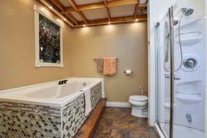 301: The Penthouse West : The Romeo & Juliet Suite | Bathroom | Hair dryer, towels, soap, shampoo - The Noble Suites (Brockville)
