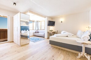 Comfort Suite, 1 Bedroom, Sauna, Mountain View | Hypo-allergenic bedding, down duvets, minibar, in-room safe - Berghotel Jochgrimm - Your hoome in the Dolomites (Aldino)
