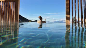 Indoor pool, pool umbrellas, pool loungers