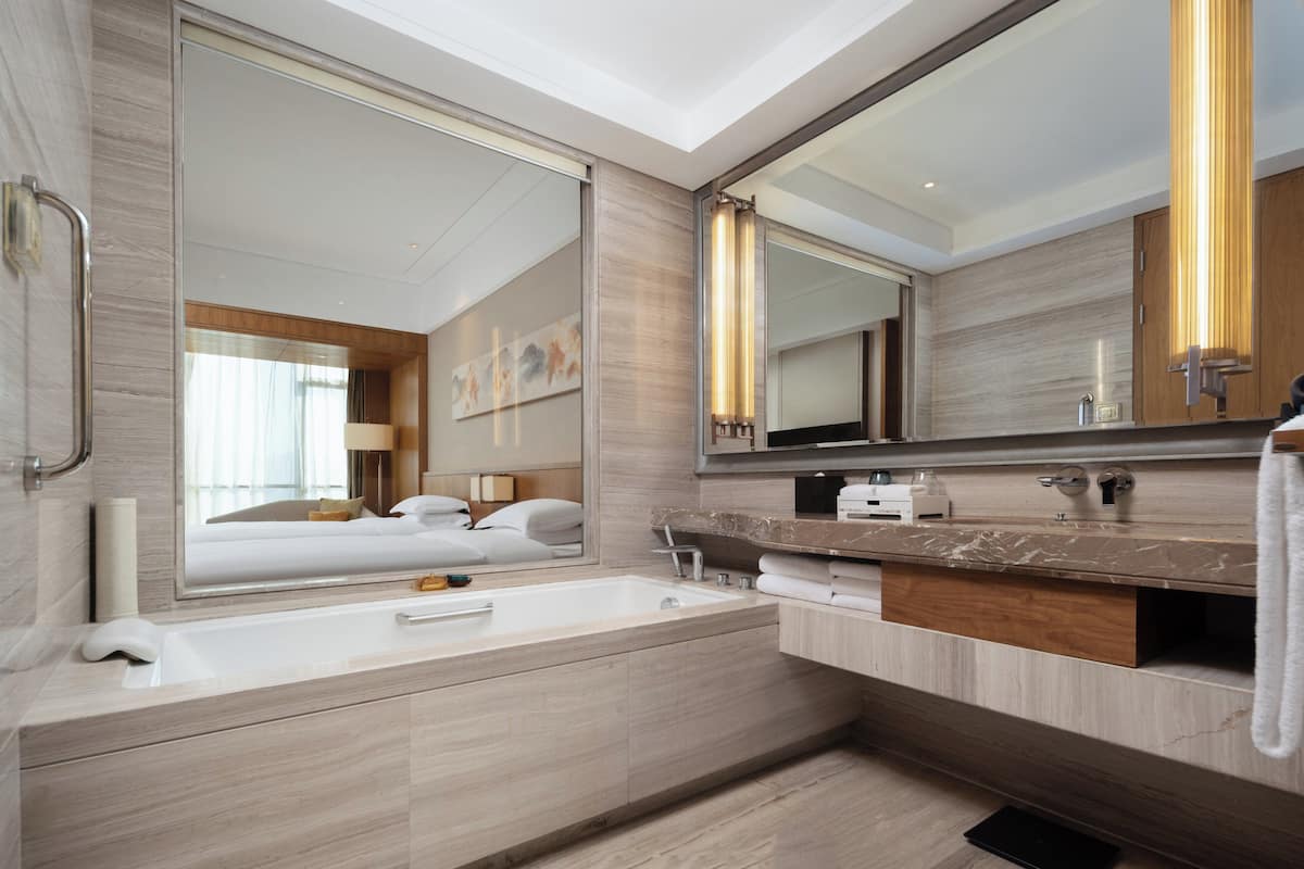 Standard Room, Multiple Beds, River View | In-room safe, desk, laptop workspace, blackout drapes