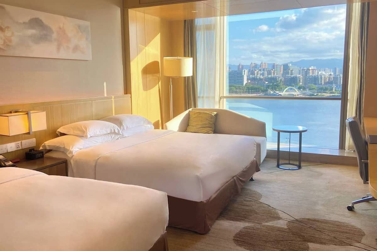 Standard Room, Multiple Beds, River View | In-room safe, desk, laptop workspace, blackout curtains