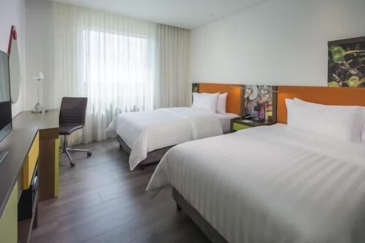 Hypo-allergenic bedding, in-room safe, desk, laptop workspace