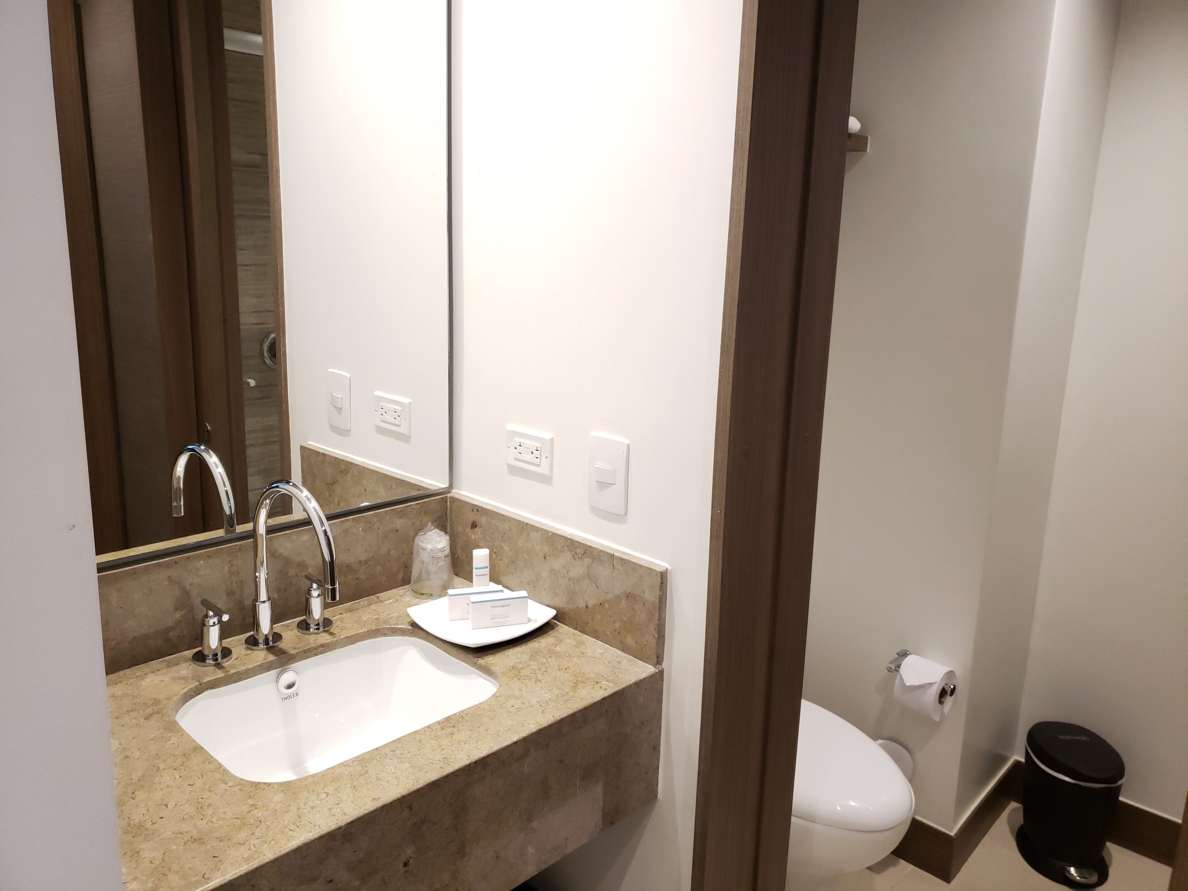 shower, designer toiletries, hair dryer, towels