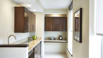 Suite, 1 King Bed, Accessible (Shower) | Desk, laptop workspace, blackout drapes, iron/ironing board