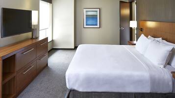 Suite, 1 King Bed, Accessible (Shower) | Desk, laptop workspace, blackout drapes, iron/ironing board