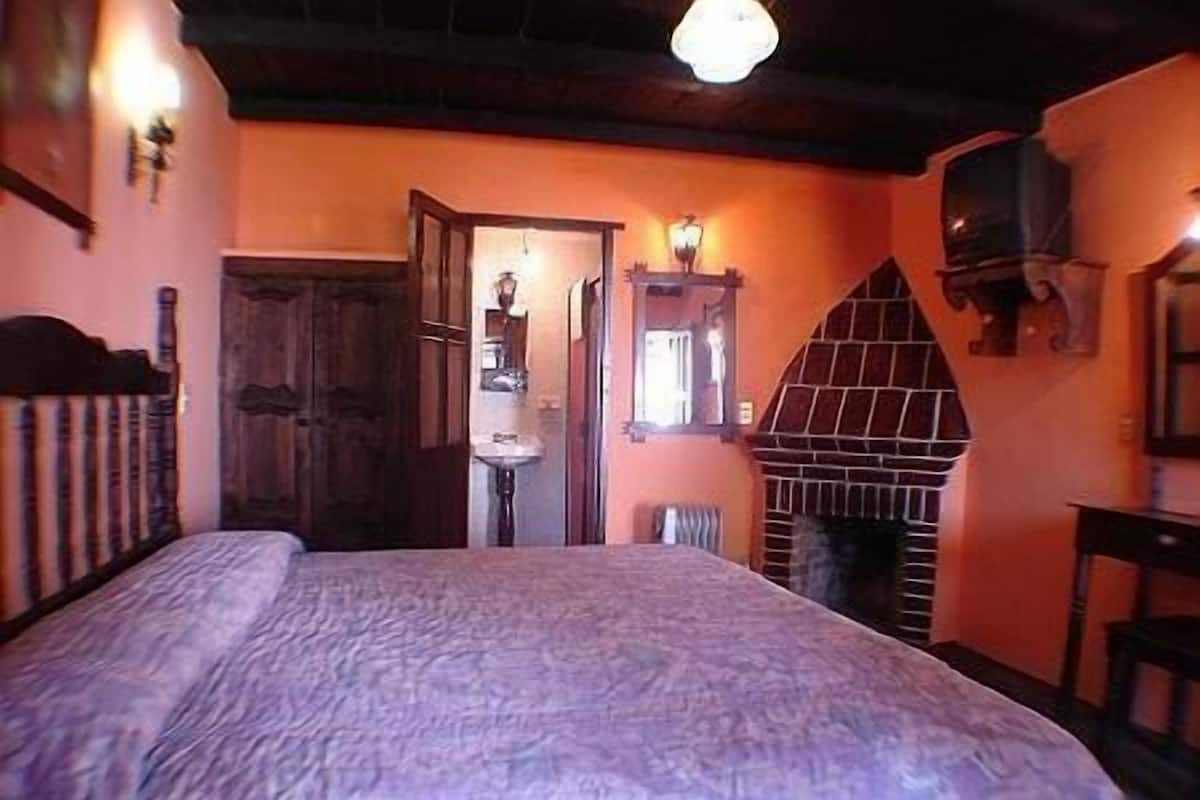 Premium bedding, down comforters, desk, laptop workspace
