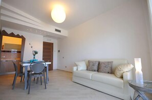 Panoramic Apartment, 1 Bedroom, Accessible, Ocean View | Living area | Flat-screen TV