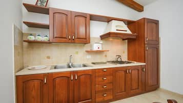 Apartment, 2 Bedrooms (4 People) | Private kitchen | Full-sized fridge, oven, stovetop, coffee/tea maker