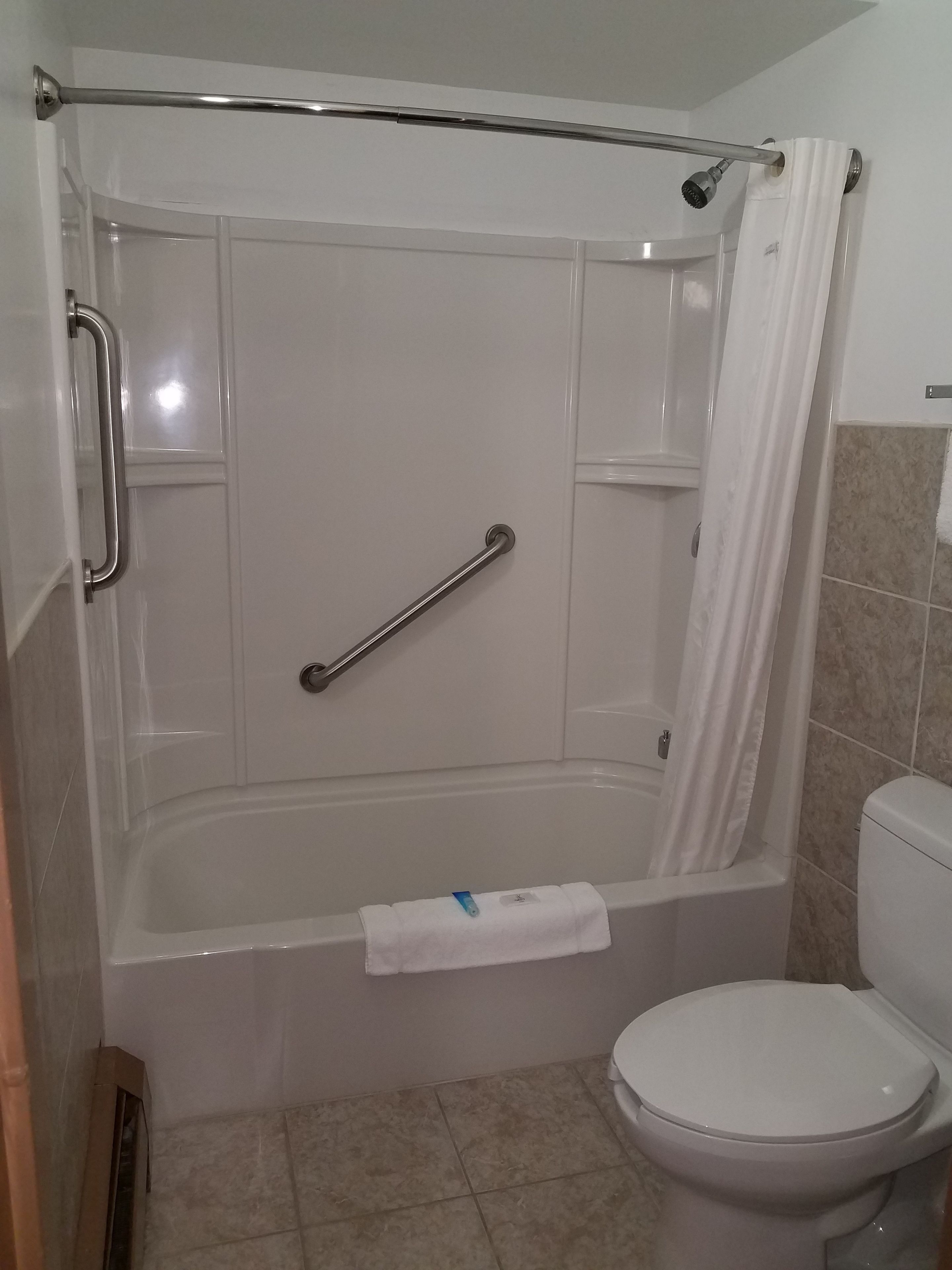 Double Room, 2 Queen Beds | Bathroom | Combined shower/bathtub, hair dryer, towels