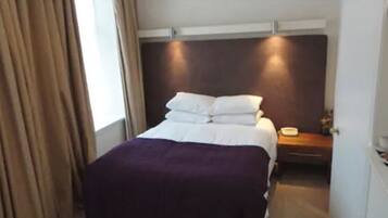 Desk, iron/ironing board, free WiFi, bed sheets