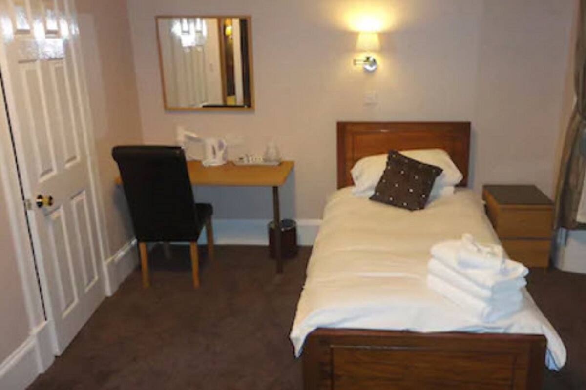 Desk, iron/ironing board, free WiFi, bed sheets