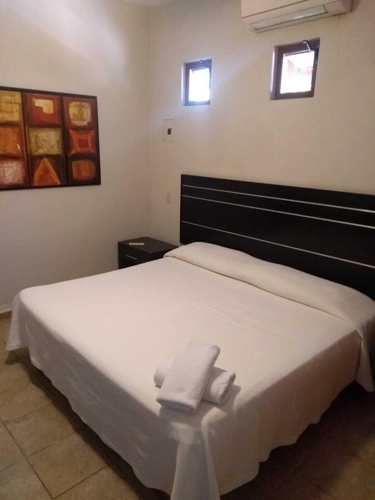 Quarto conforto, vista para o pátio | Roupas de cama premium, frigobar, cofres nos quartos, roupa de cama