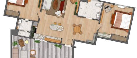 A floor plan of a hotel room with a bed, a sitting area with a table and chairs, a small kitchen area, and a bathroom.