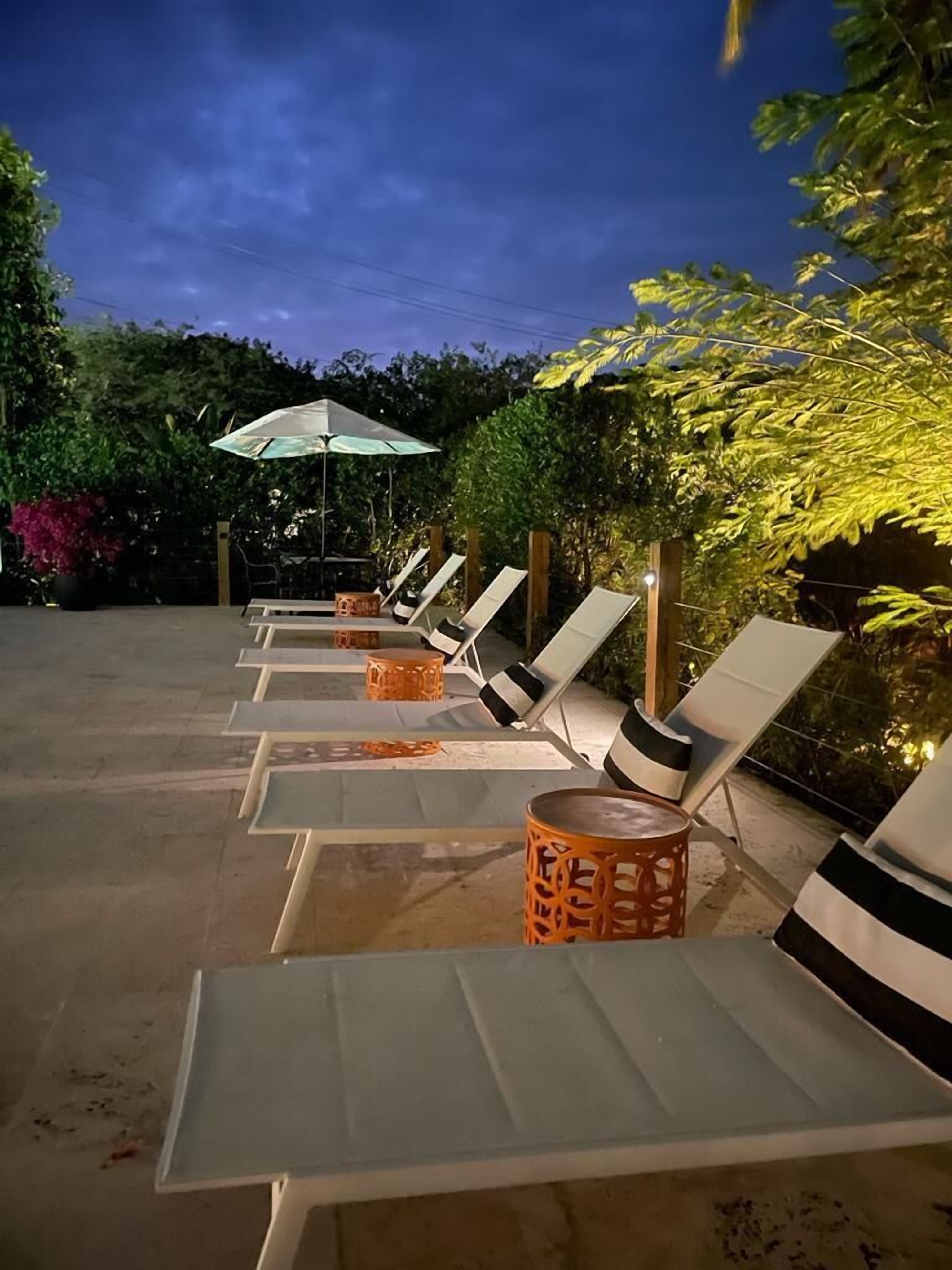 outdoor pool, pool loungers