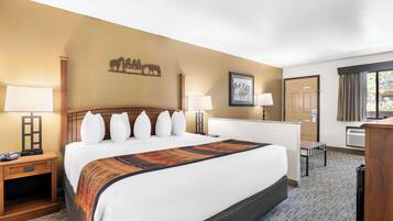Suite, 1 King Bed, Non Smoking, Refrigerator & Microwave (with Single Sofabed) | Blackout drapes, iron/ironing board, free cribs/infant beds