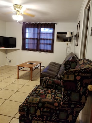 Deluxe Cottage, 2 Bedrooms | Living room | TV