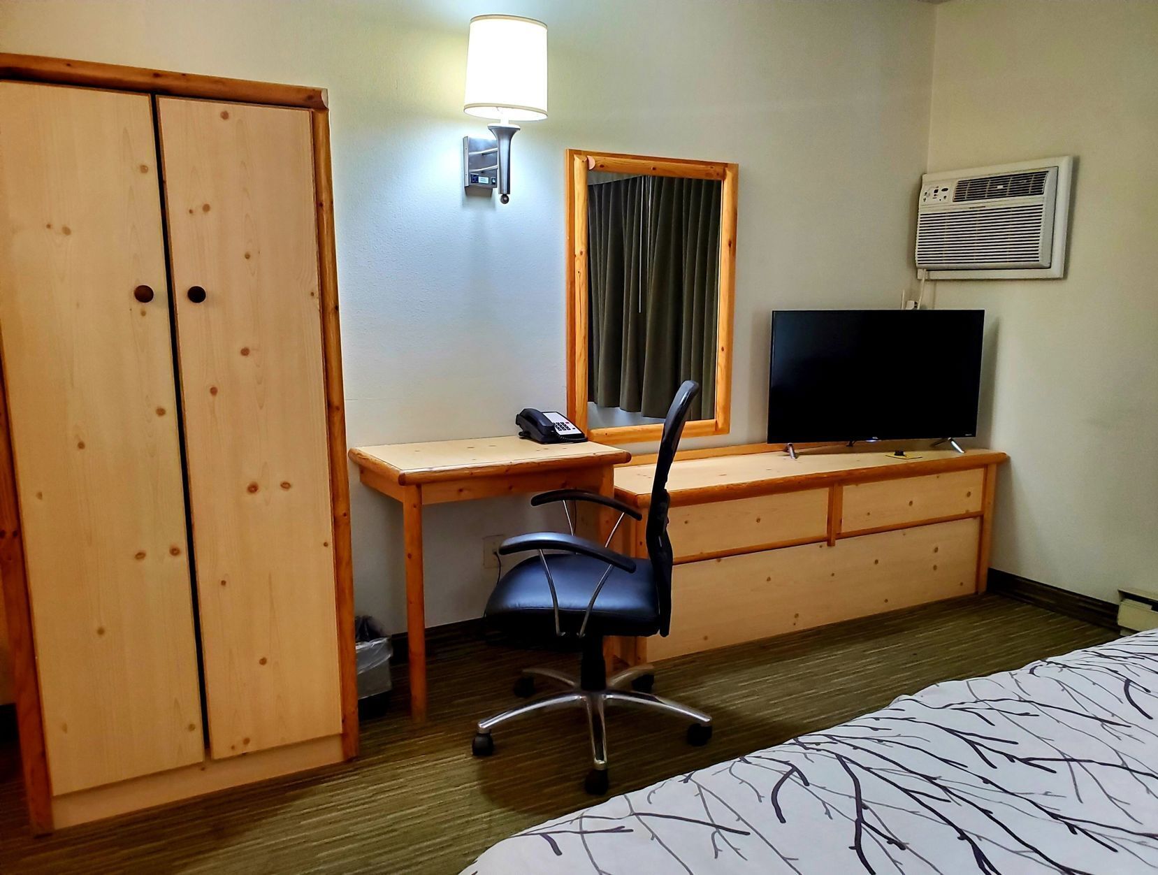 Desk, laptop workspace, blackout drapes, soundproofing