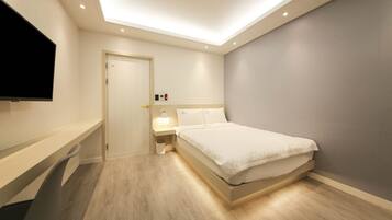 Standard Double Room, 1 Double Bed, Non Smoking | Laptop workspace, blackout drapes, iron/ironing board, bed sheets