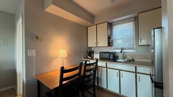 Standard Room, 2 Queen Beds | Private kitchen | Coffee/tea maker