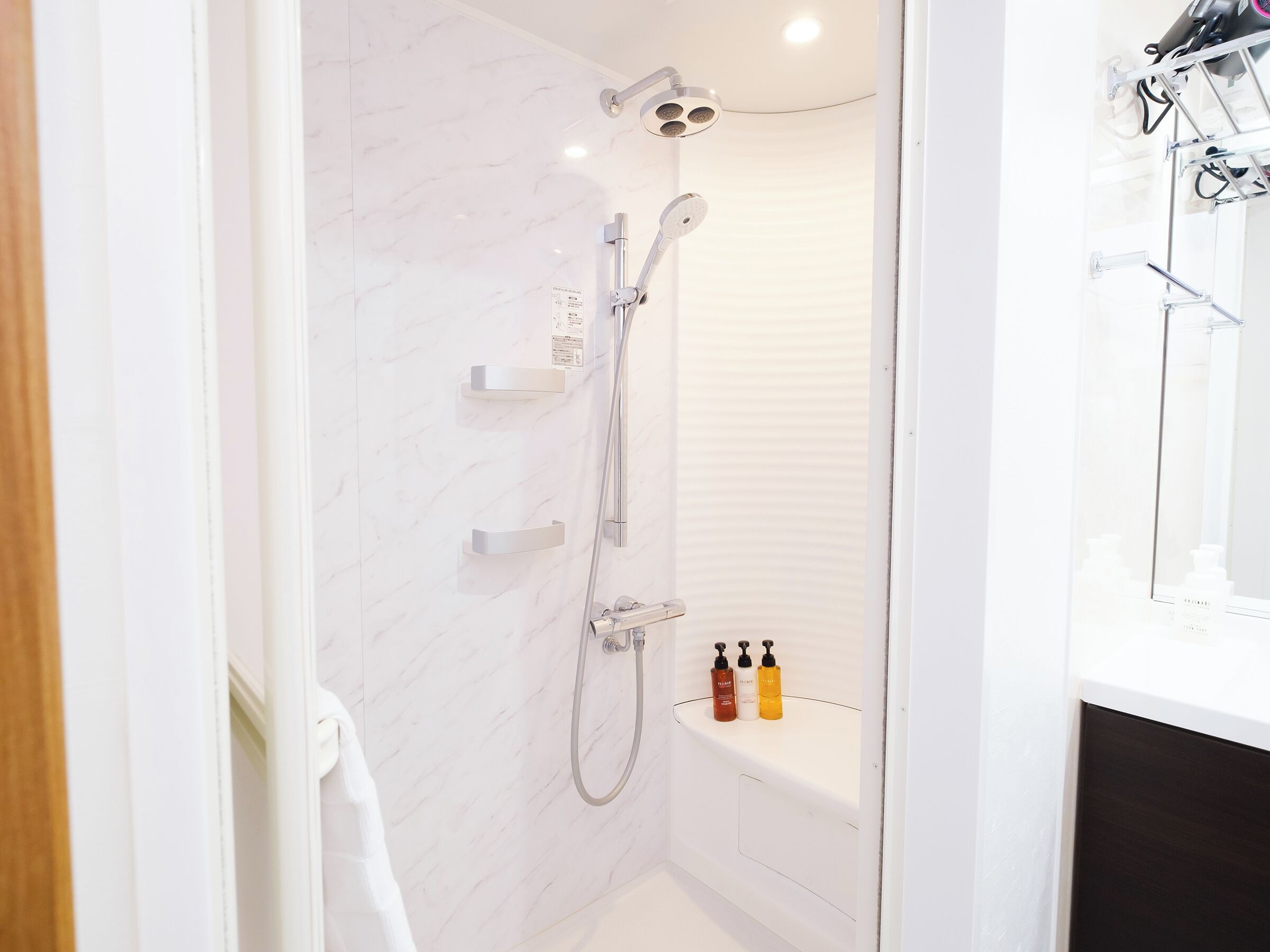 twin room, b-sb  , non smoking [with shower booth](east wing)  | bathroom | hair dryer, bathrobes, slippers, bidet