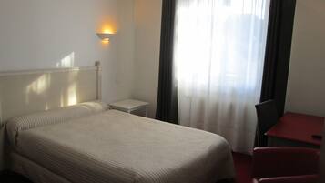 Desk, free WiFi, bed sheets