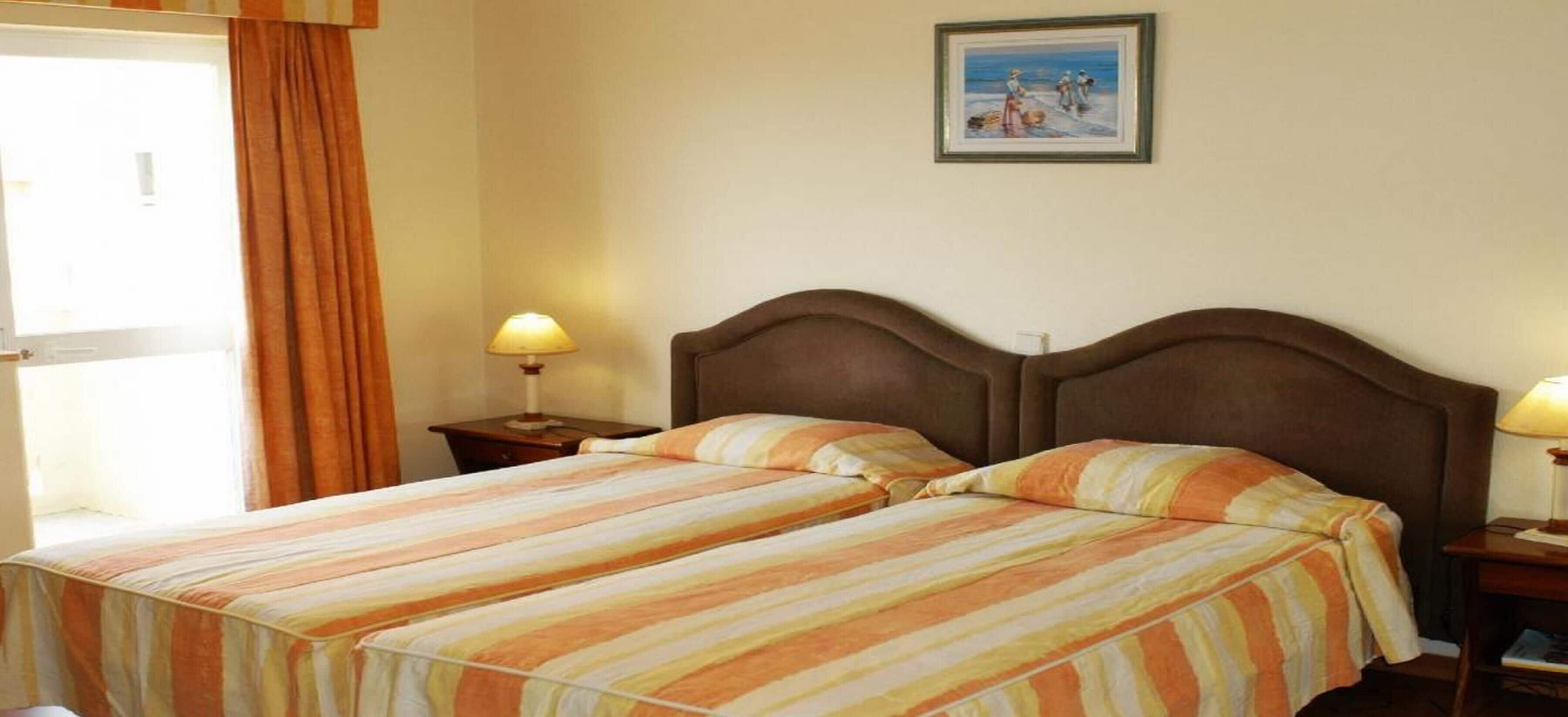 Desk, blackout curtains, free WiFi, bed sheets