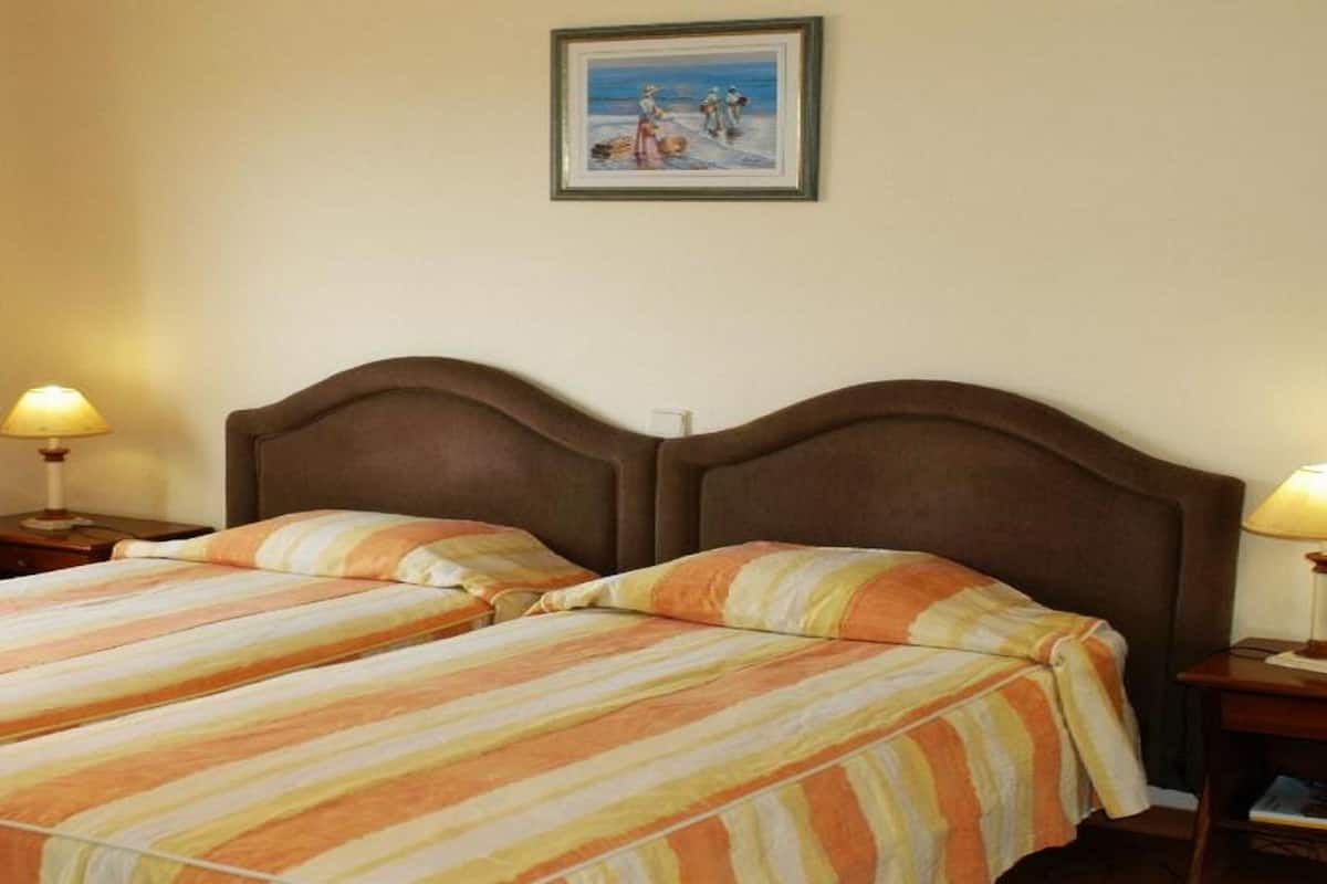 Desk, blackout curtains, free WiFi, bed sheets