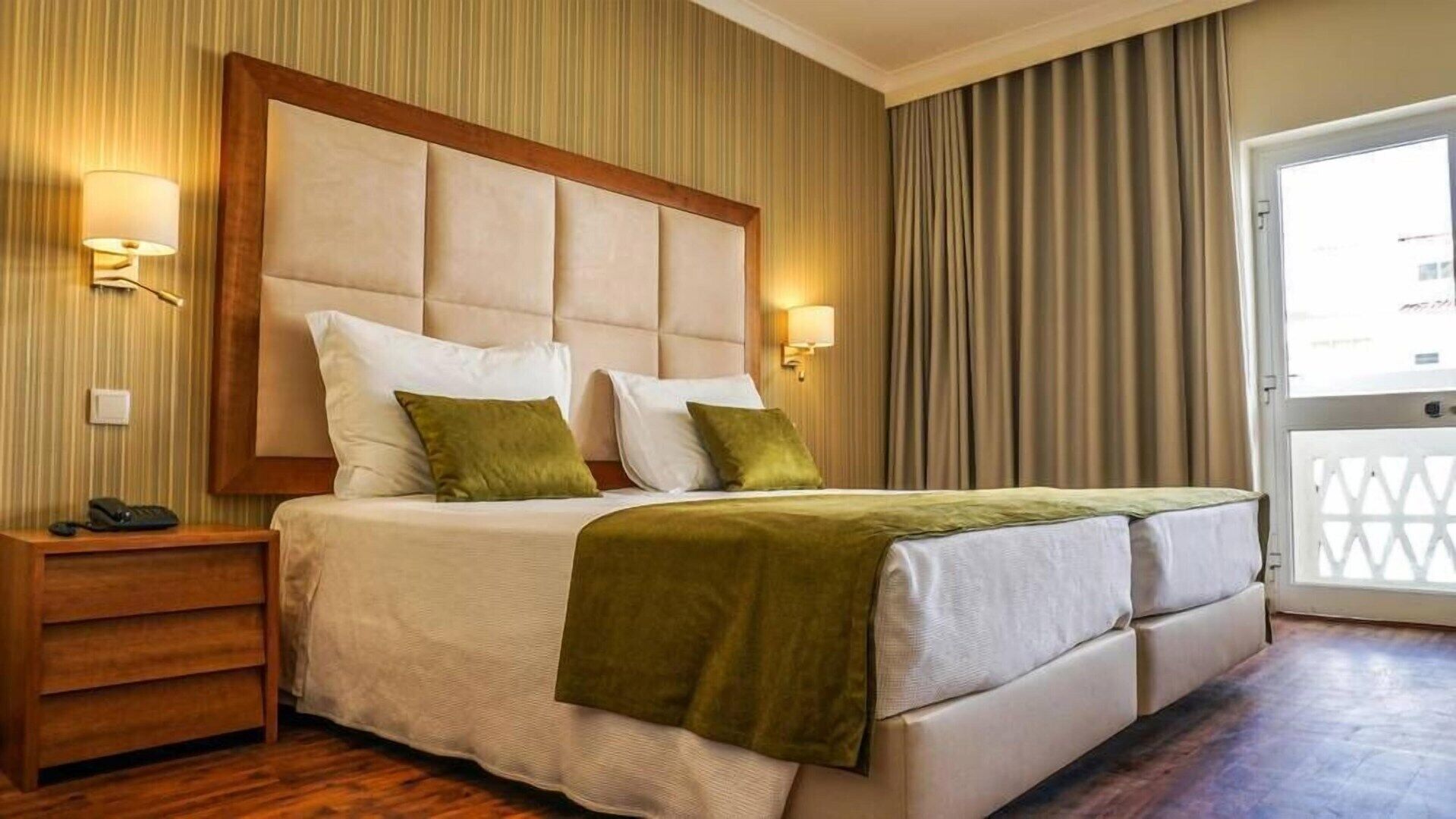 Desk, blackout curtains, free WiFi, bed sheets