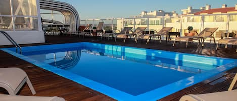 Outdoor pool, open 9:00 AM to 7:00 PM, sun loungers