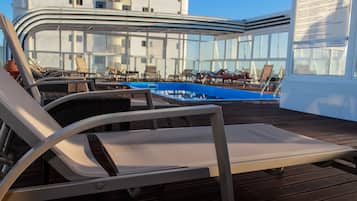 Outdoor pool, open 9:00 AM to 7:00 PM, sun loungers