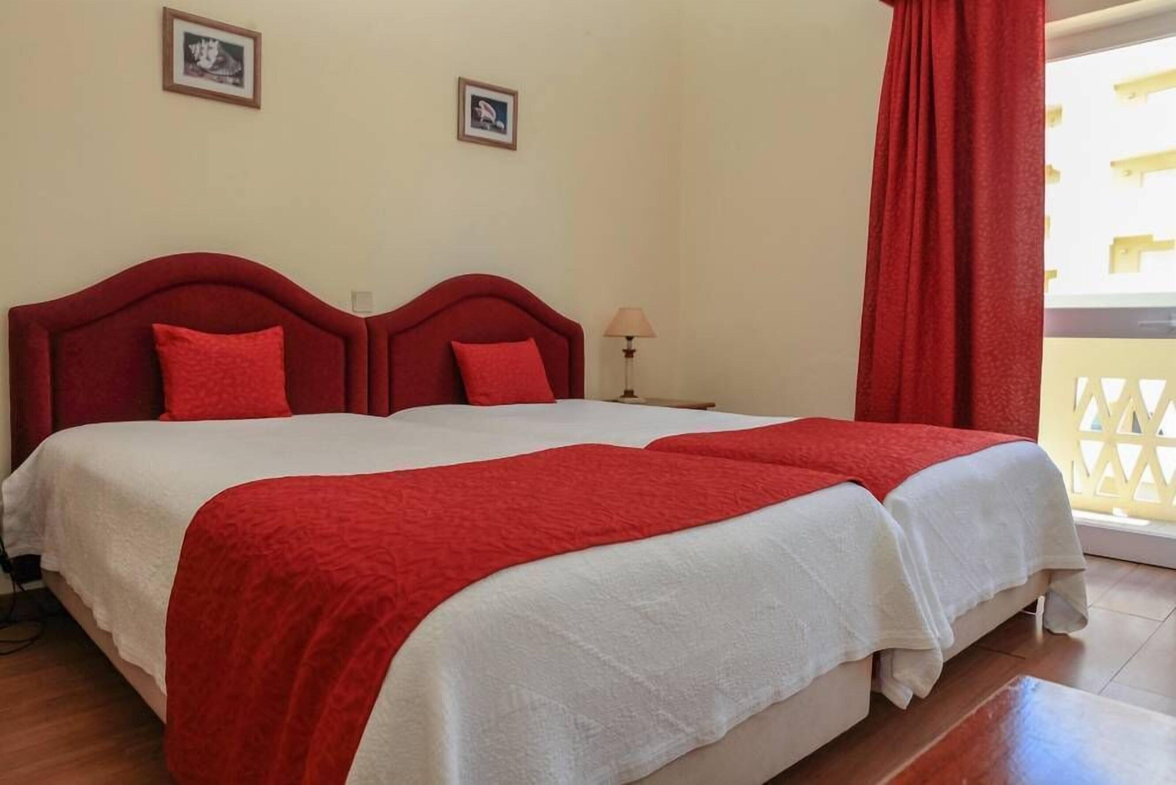 Desk, blackout curtains, free WiFi, bed sheets