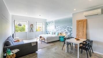 Family Suite, River View | In-room safe, blackout curtains, soundproofing, iron/ironing board